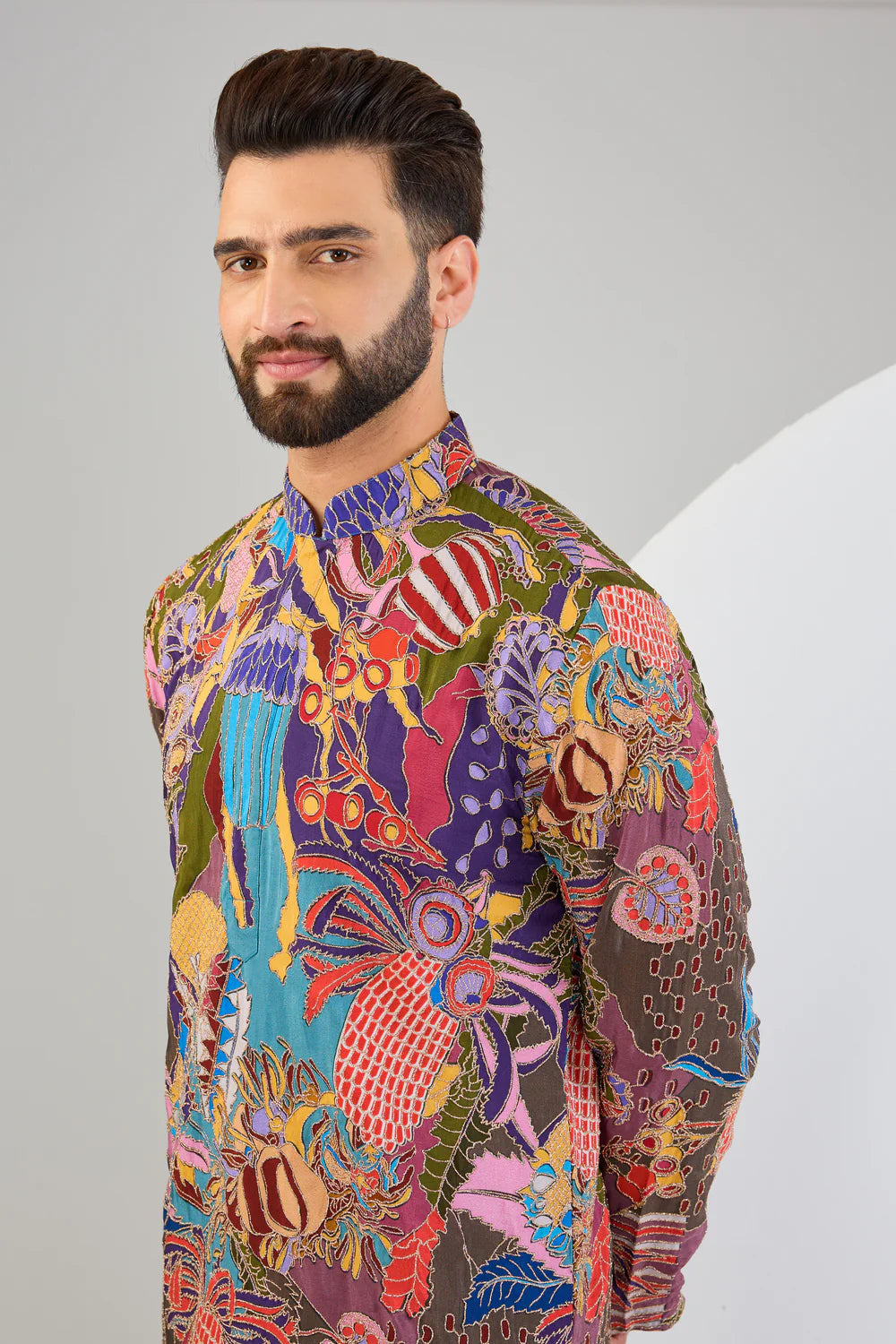 MULTI-COLOUR ABSTRACT KURTA WITH HIGHLIGHTS OF ZARI EMBROIDERY